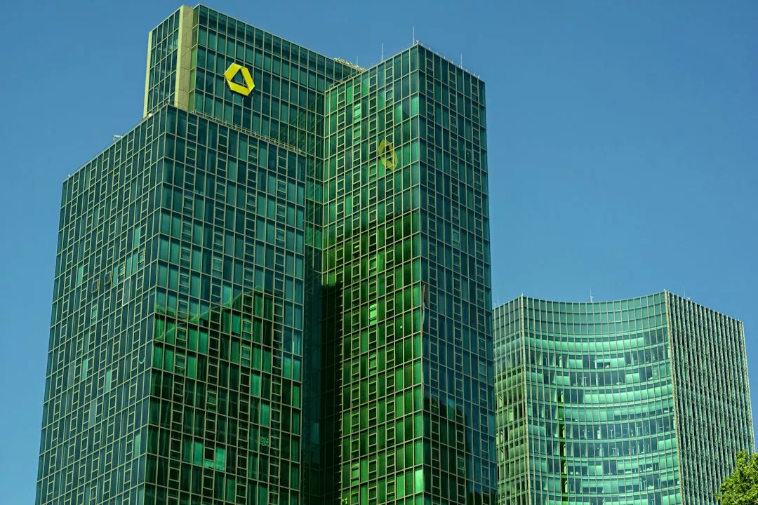 Modern skyscrapers rise against a blue sky