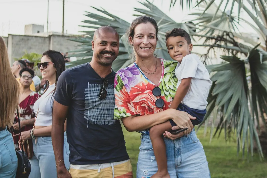 a group of people standing next to each other